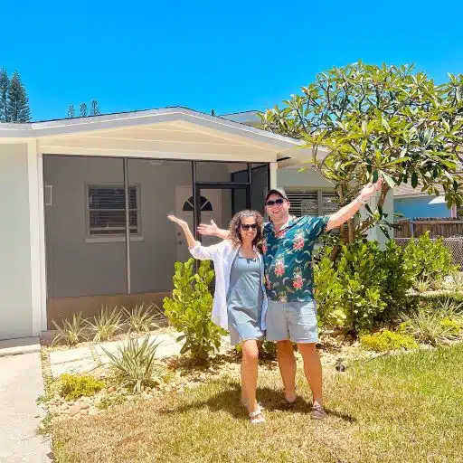 Owners Greg and Sydney proudly stand in front of Waveland House, their beautiful vacation rental in Jensen Beach. Learn about us and Waveland House here.
