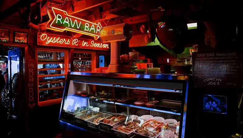 conchy-joes-seafood-jensen-beach-restaurant Conchy Joe's Seafood raw bar has vibrant neon lights and fresh seafood. Enjoy the waterfront views at this local restaurant!