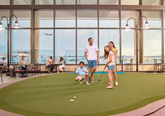 palm-beach-international-airport-putt-green-pbi-putting Palm Beach International Airport near Jensen Beach has been rated a top 10 US airport. PBI even has a putting green you can practice your putts on while waiting for your flight.